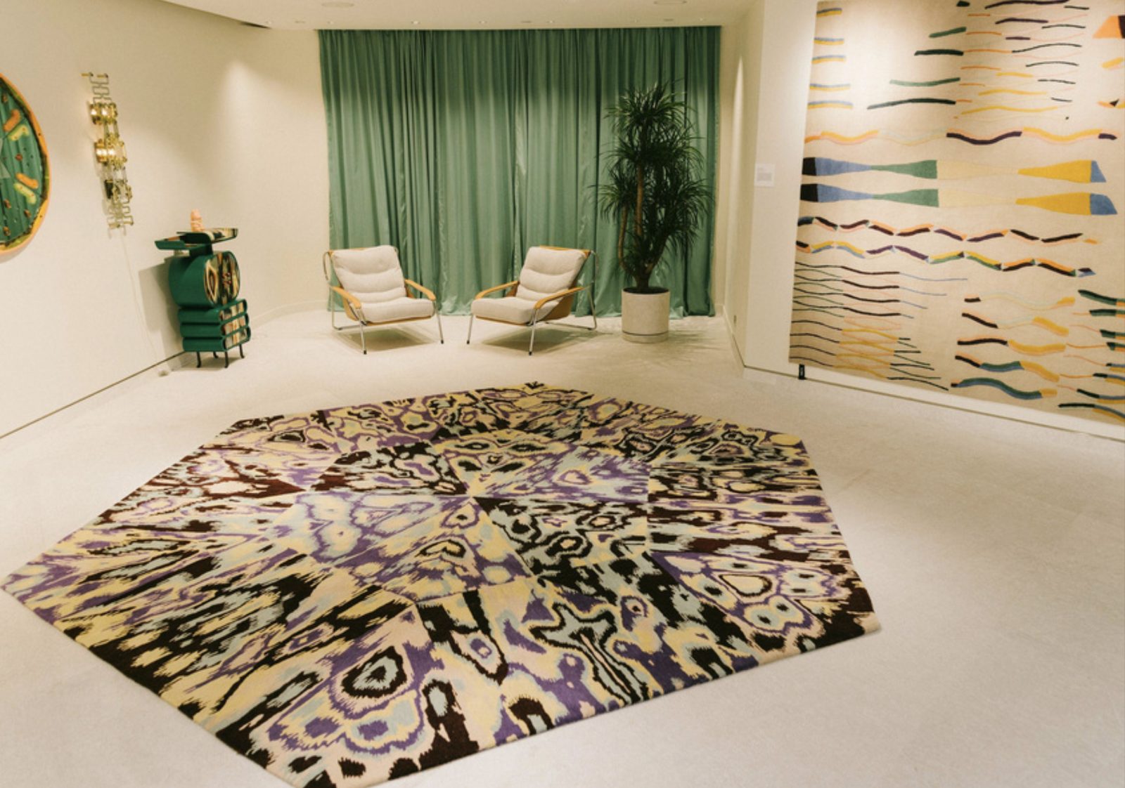 The exhibition room — tapestry, wall hangings and the green cabinet